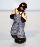Shearwater Figurine of Man with Hands in His Overalls