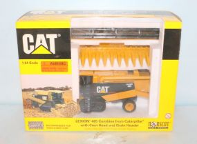 Norscot Cat Lexion 485 Combine w/ Corn Head & Grain Header