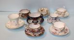 Eight Hand Painted Cups and Saucers