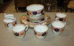Four English Cups, Sugar, Creamer, Four Saucers, Three Small Plates, Two Cabinet Plates Three small plates 6