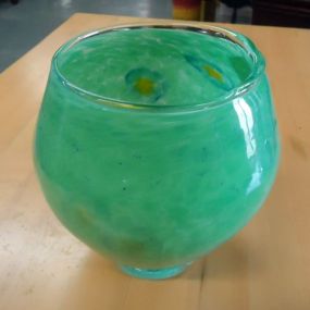 Hand Blown Glass Vase Green hand blown glass vase, signed. 6 3/4