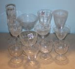 Group of Twelve Various Style Stem Glasses Group of Twelve Various Style Stem Glasses; five various etched glasses (some with chips) 7 1/4