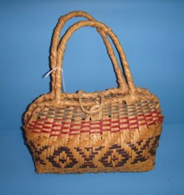 Choctaw Basket (Purse) Choctaw Basket (Purse), two handles and woven latch in green, tan, yellow, dark brown with two handles; 12