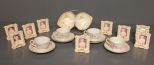 Demitasse Cups, Divided Dish and Frames Description: Four Demitasse Cups with Saucers, Divided Dish with Floral pattern and Nine Small Decorative Frames with Floral pattern.