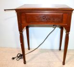 Singer Sewing Machine in Walnut Cabinet