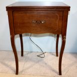 White Sewing Machine in Walnut Cabinet