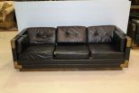 Black Three Cushion Sofa with Brass Straps