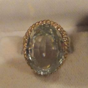 One 10KT yellow gold lady's cast spinel ring One 10KT yellow gold lady's cast spinel ring with a tapered shank with a bright polish finish. Containing: One prong set oval standard brilliant cut synthetic, measuring 8.15 x 13.30 x 6.60mm, 10% bul