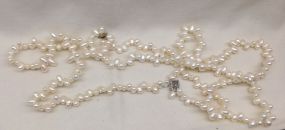 Lady's Irregular Freshwater Pearl Strand Lady's Irregular Freshwater Pearl Strand with silver clasp; 15