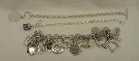 Three Sterling Lady's Charm and Link Bracelets Three Sterling Lady's Charm and Link Bracelets; 3.69 ozt