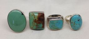 Four Sterling Silver Lady's Turquoise Rings Four Sterling Silver Lady's Turquoise Rings with a Bright Polish Finish. Sizes Vary.