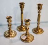Four Small Brass Candlesticks