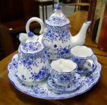  Child's Blue and White Porcelain 8 Piece Tea Set Child's blue and white 8 piece tea set, hand painted, unmarked - 4 1/2