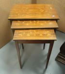 Three Mahogany Nesting Tables Set of three mahogany tulip inlaid nesting tables, largest is 24