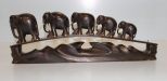 Elephants have ivory tusks and eyes, some cracks, some ivory, and elephant missing; 18