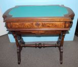 Victorian Walnut Renaissance Revival Library Table/ writing desk. Nineteenth century burl walnut writing desk with felt top, center drawer, over sewing cabinet drawer; 32