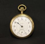 17 Jewel Rockford pocket watch. Glass front unscrews but can not open. (Missing on hand), etching on the back