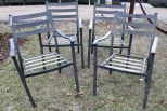 Four Outdoor Arm Chairs