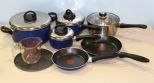 Five T-Fal Pot and Pans & Mixing Cup