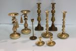 Seven Brass Candlesticks & Two Metal Candlesticks