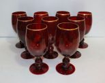 Nine Ruby Red Goblets with Gold Trim