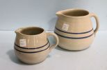 Two Stoneware Pottery Pitchers