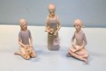 Three Bisque Figurines