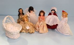 Two Madame Alexander Dolls, Four Other Dolls & Small Wicker Doll Crib