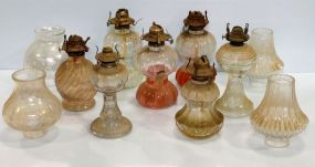Seven Glass Kerosene Lamps & Shades