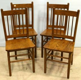Four Oak Spindle Back Chairs