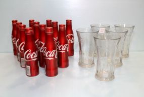 Set of Twelve Painted Aluminum Coke Bottles & Five Coke Glasses