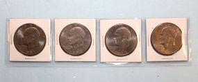 Four Eisenhower Liberty Silver Dollars 