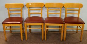Set of Four Light Wood Restaurant Chairs