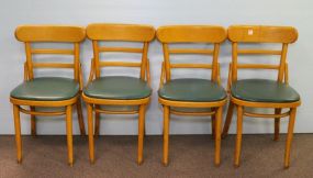 Set of Four Light Wood Restaurant Chairs