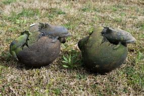 Two Pottery Dolphin Statues