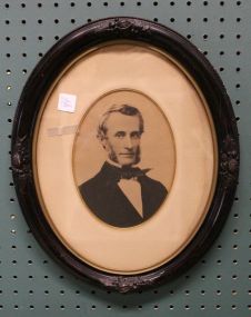 Print of Man in Oval Fruit Carved Frame
