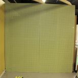 Green Eight Foot Pegboard Wall