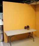 Orange Eight Foot Pegboard Wall