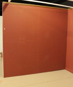 Red Eight Foot Pegboard Wall