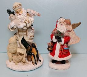 Two Resin Santa Figurines