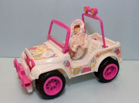 Plastic Barbie Jeep & Small Porcelain Doll