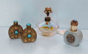 Four Perfume Bottles