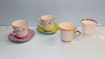 Four Assorted Coffee Cups & Two Saucers