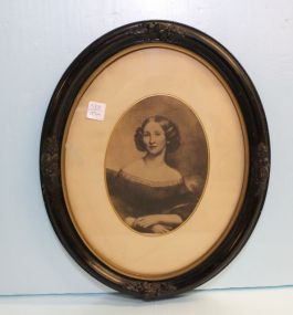 Woman's Picture in Carved Oval Frame