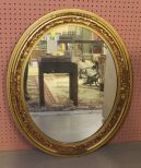 Oval Mirror in Gold Carved Frame