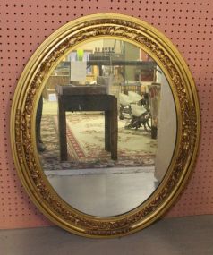 Oval Mirror in Gold Carved Frame