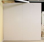 White Eight Foot Pegboard Wall