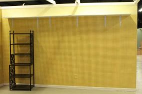 Yellow Eight Foot Pegboard Wall with Shelf