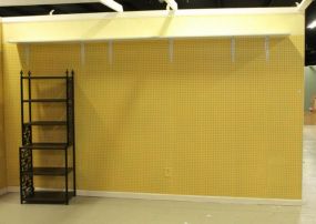 Yellow Eight Foot Pegboard Wall