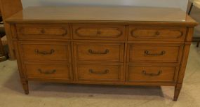 Nine Drawer Glass Top Dresser